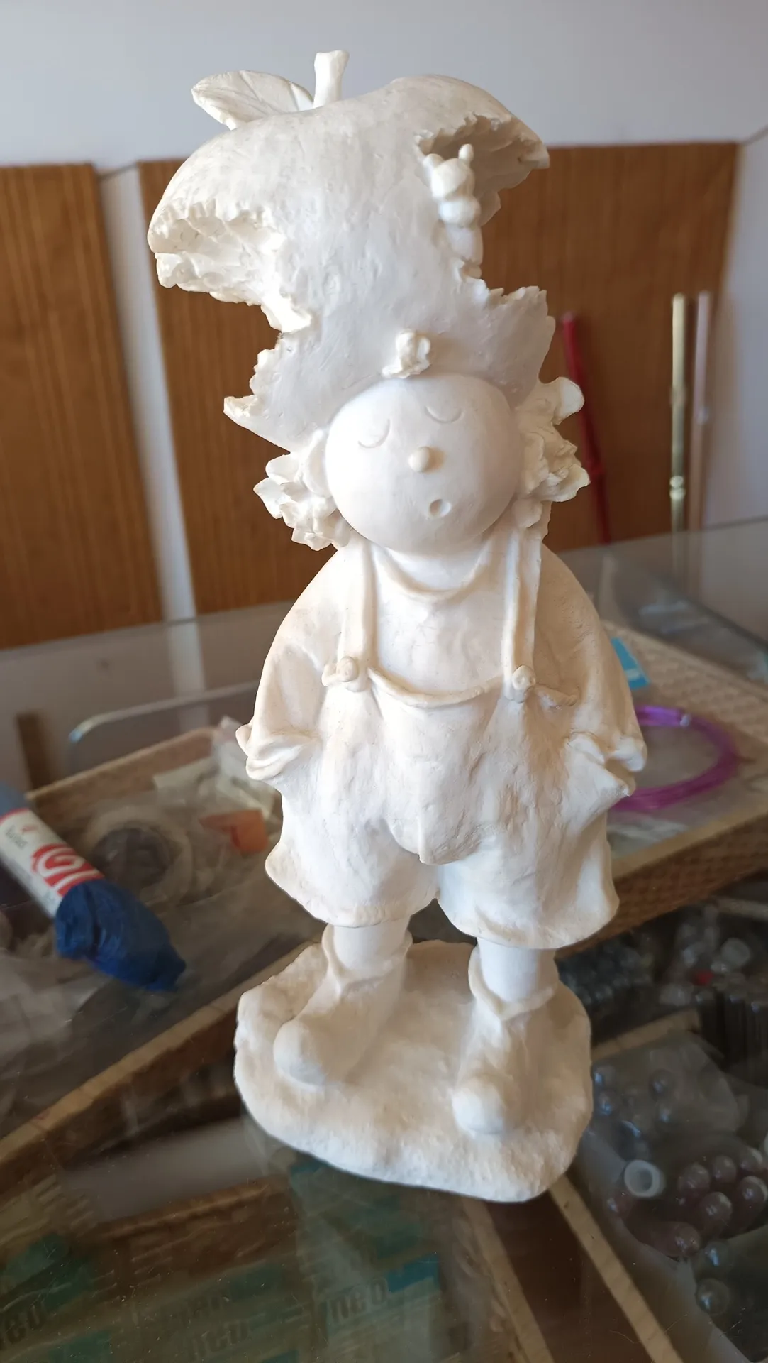 Niño manzana mordida marmolina 25cm